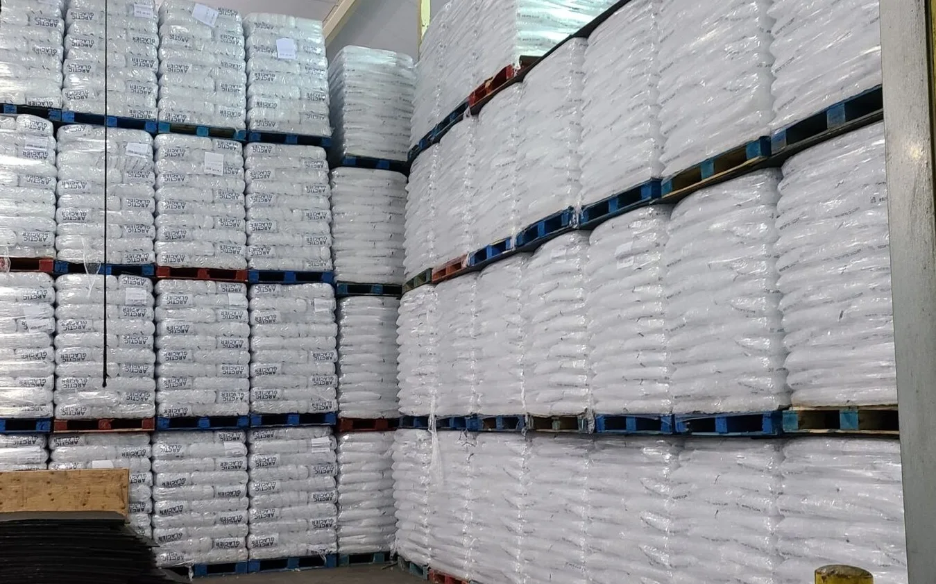 ice storage freezer with stacked pallets of ice